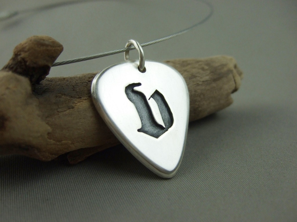Sterling Silver Guitar Pick Pendant the silver