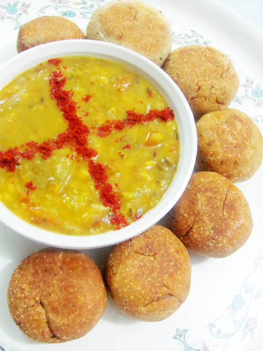 Stuffed Daal Baati Baked wheat balls in Lentil Curry Dal Bati