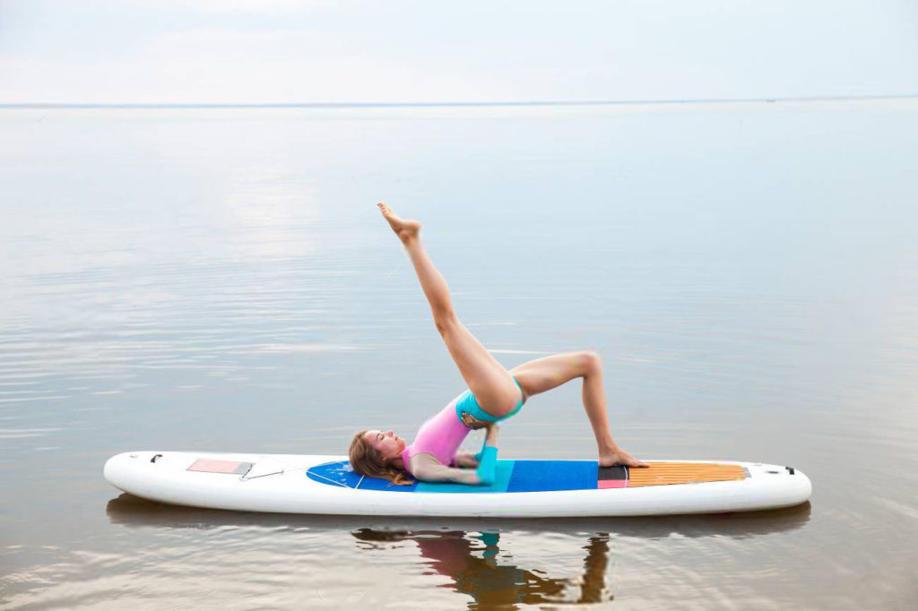 10 Benefits To Taking A StandUp Paddle Boarding (SUP) Yoga Class In Your City Beginner's Guide