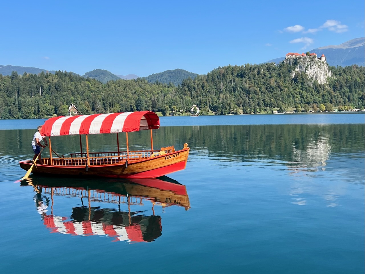 Riding the Pletna Boat to Lake Bled Island on a BellRinging Quest