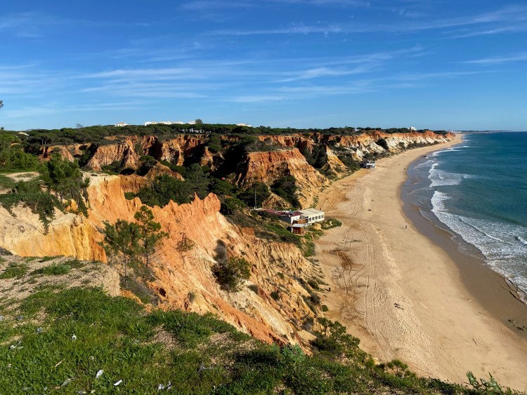 orange cliffs above the long beach