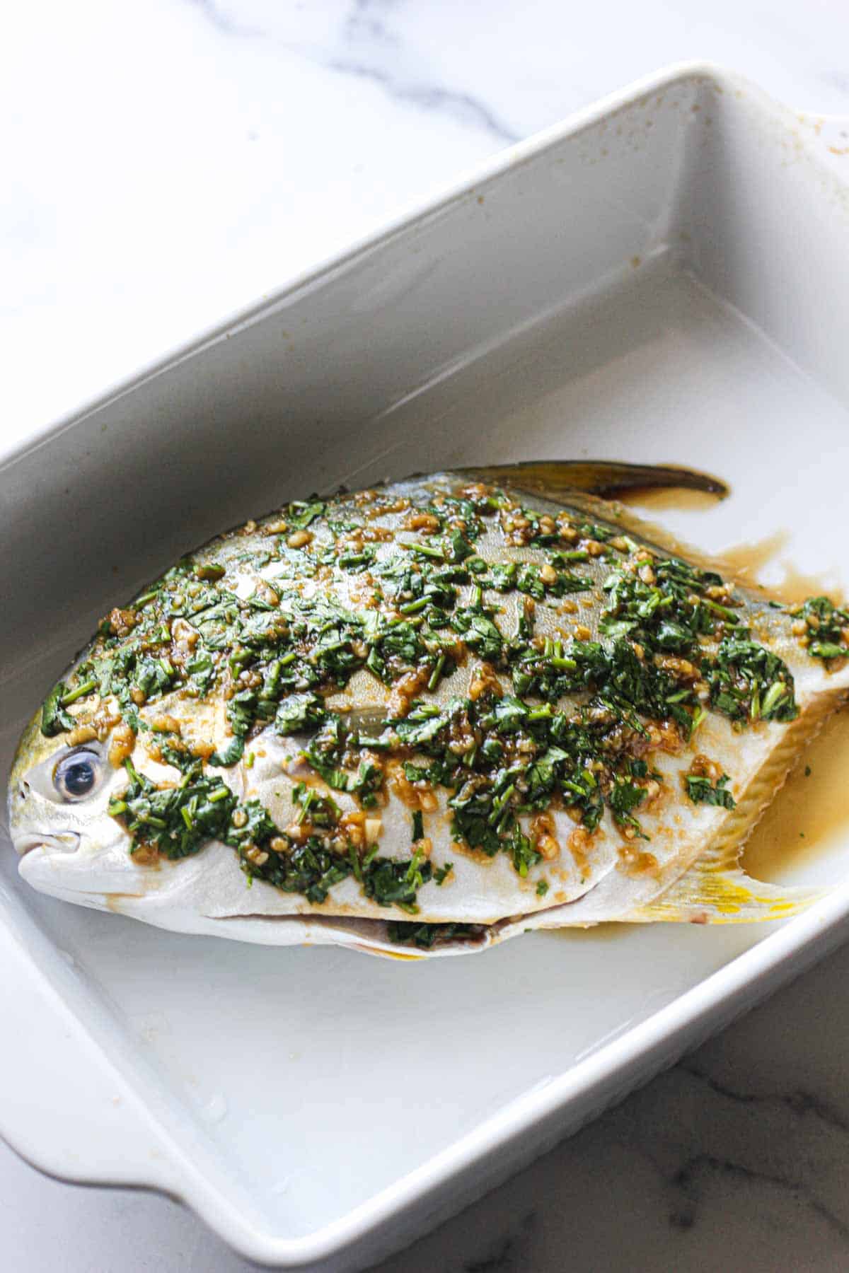 Whole baked pompano with lemon ginger sauce The Top Meal