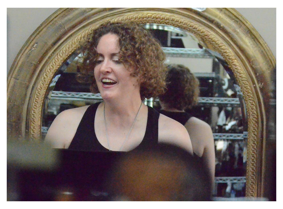 Sara Cate Langham entertains at Hope Chest resale store in Aurora The