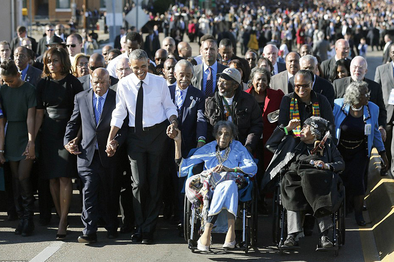‘Our march is not yet finished.’ Thousands gather to see Obama mark