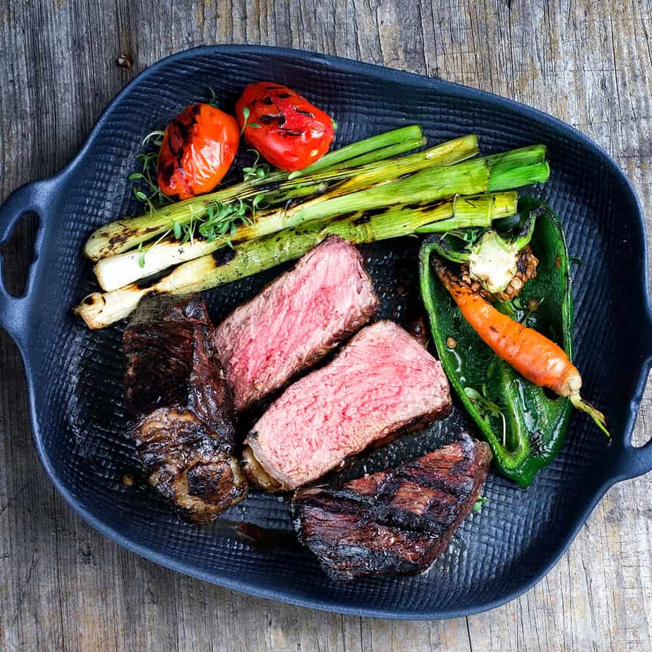 Barbecue dry aged wagyu roast beef steak with vegetable and herb