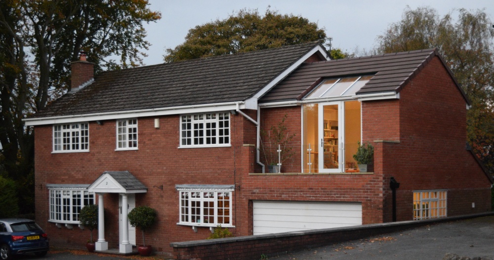 New house design for sunlight in Macclesfield. Makes house good as new.