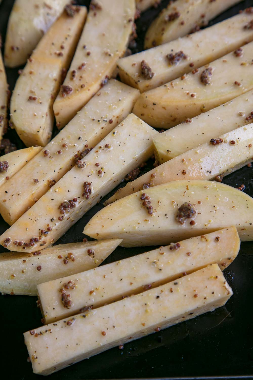 Swede Chips with Grain Mustard, Salt & Cracked Pepper Thinly Spread
