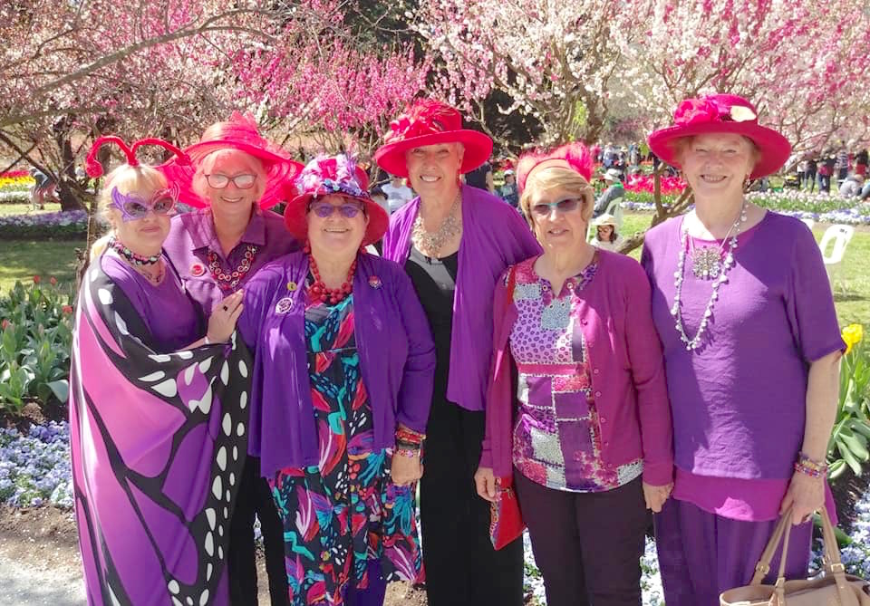 Red Hatters fit in with a splash of purple to connect women in Canberra