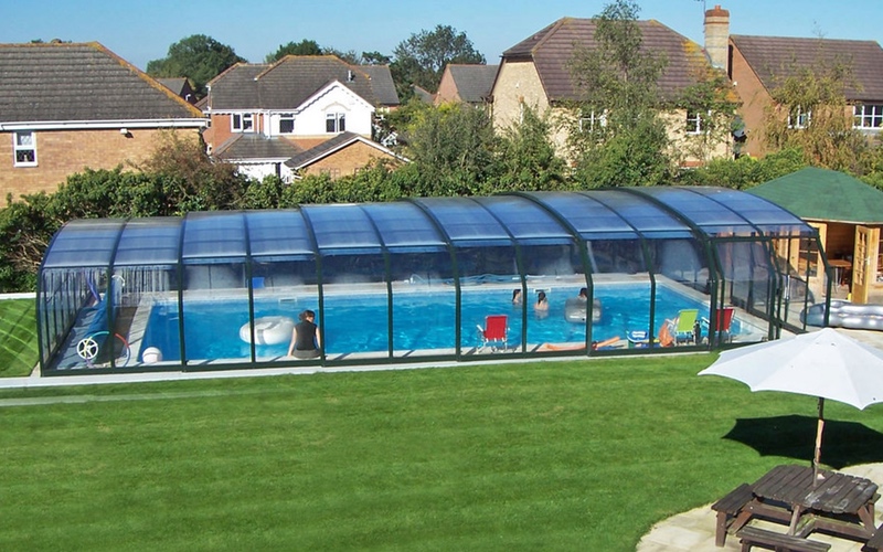 This Cover Turns Your Outdoor Pool into an Indoor Pool