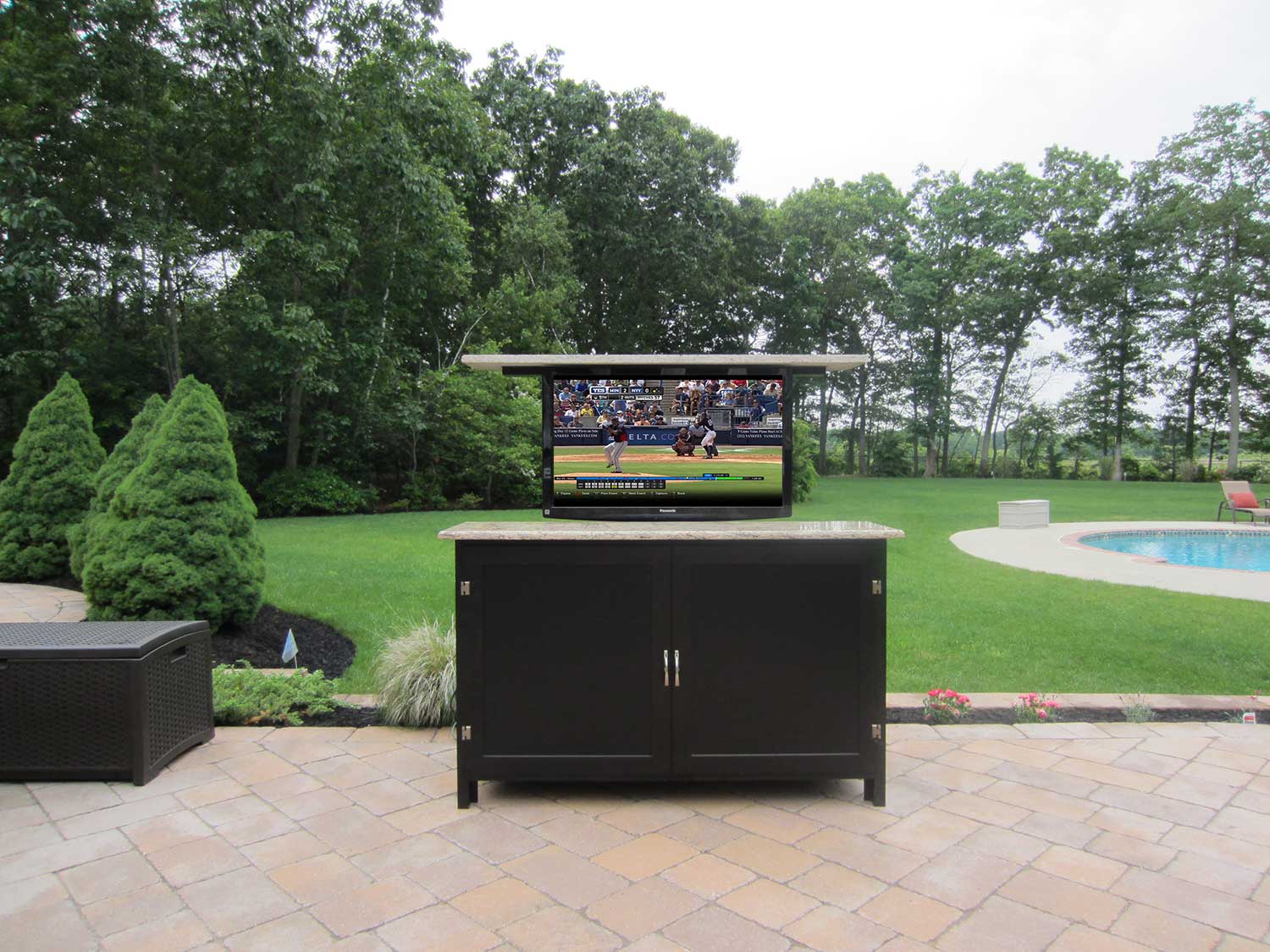 Outdoor TV Lift Thomas Outdoor Kitchens