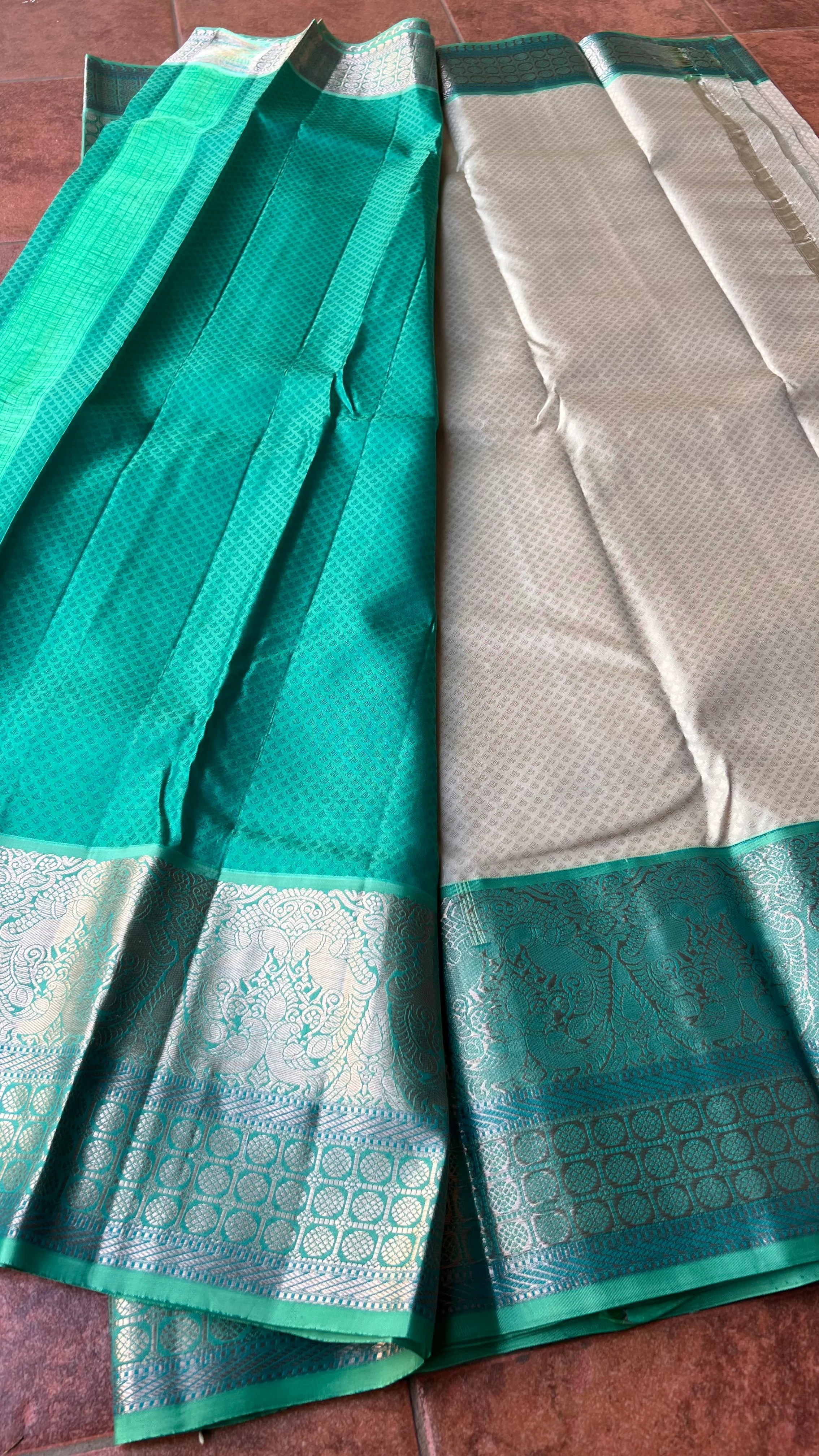 Half white and sea green kanjivaram silk saree with blouse Threads