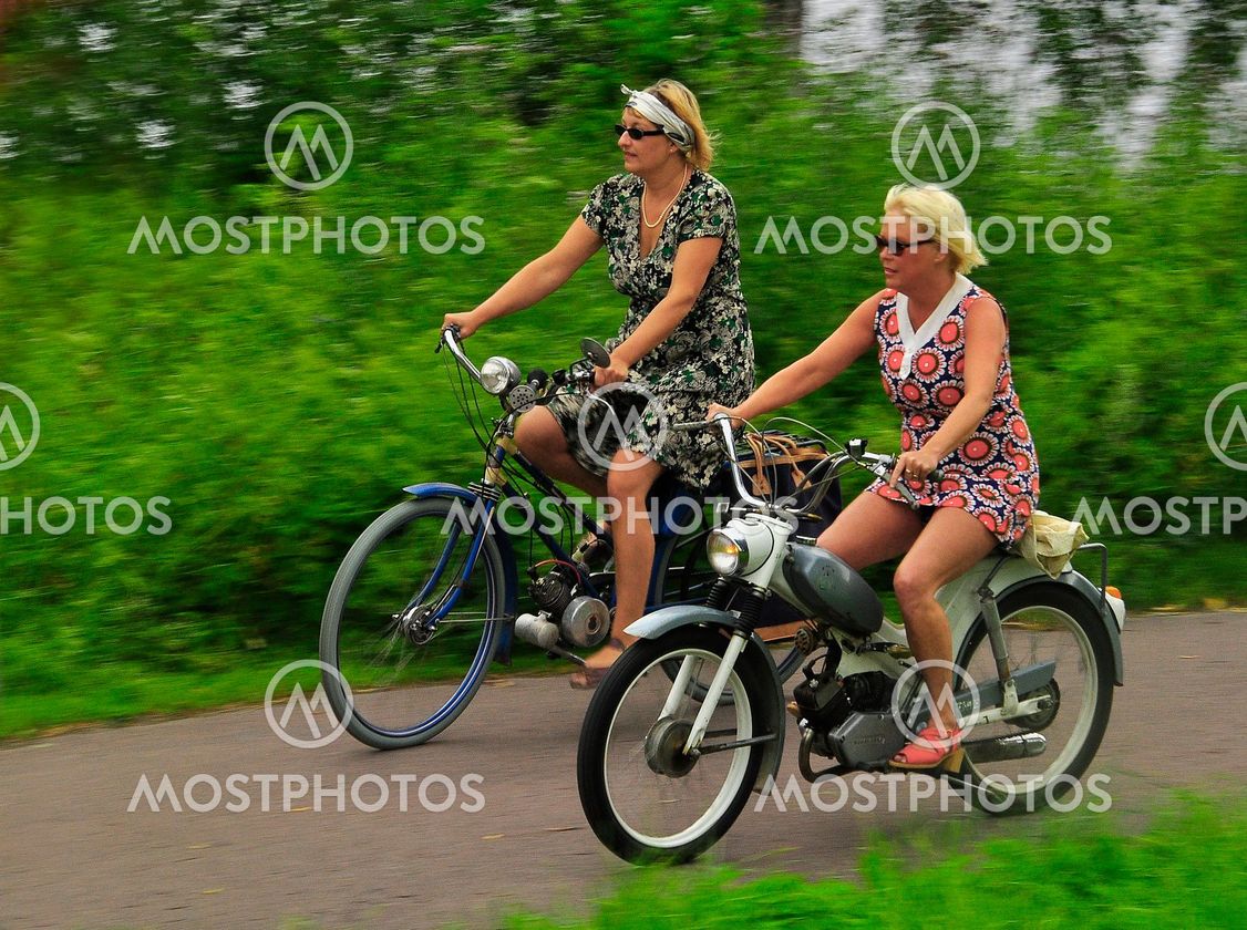 "moped, girl" by Maths Husander Mostphotos