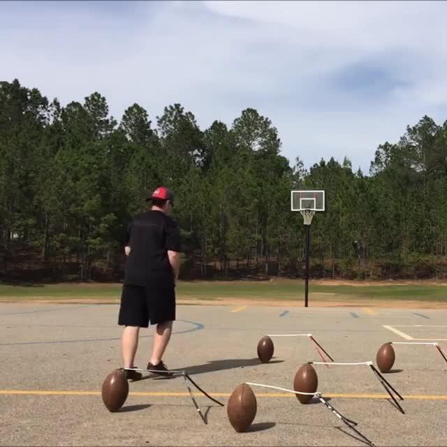 Kid Throws Football into Basketball Hoop from Far Away Jukin Media Inc