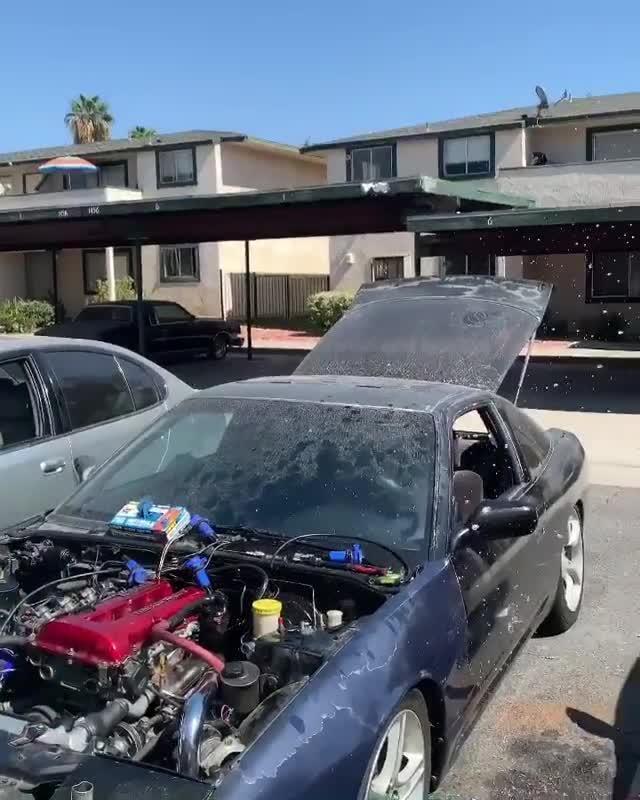 Guy Trying to Unflood Car's Engine Causes Car to Catch Fire Jukin