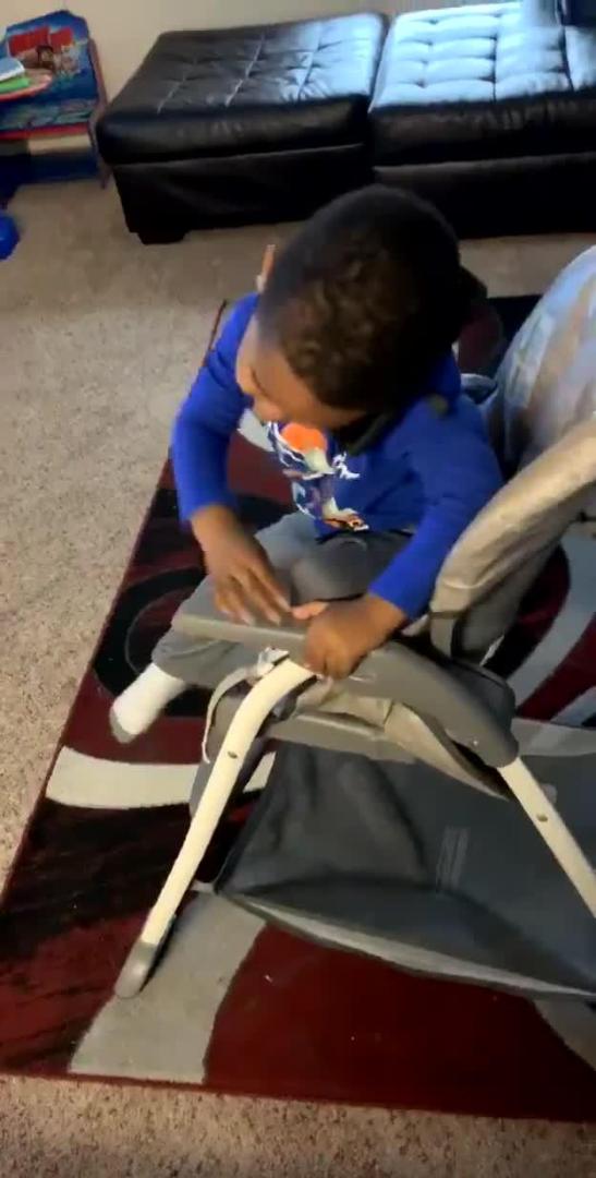 Toddler Falls Off Chair While On Phone Jukin Licensing