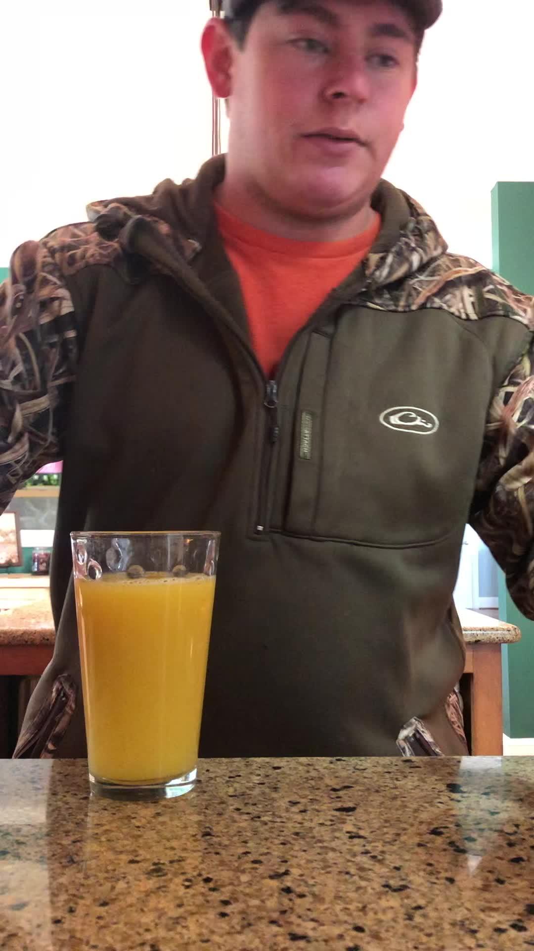 Guy Chokes on Juice While Drinking it Through Paper Towel Roll Jukin