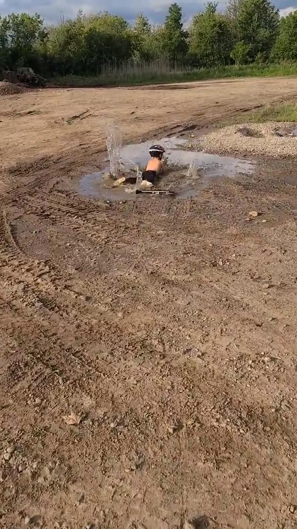 Kid Falls Off Scooter Into Giant Puddle Jukin Media Inc