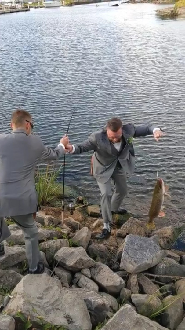 Man Catches Fish Moments Before Wedding Jukin Licensing