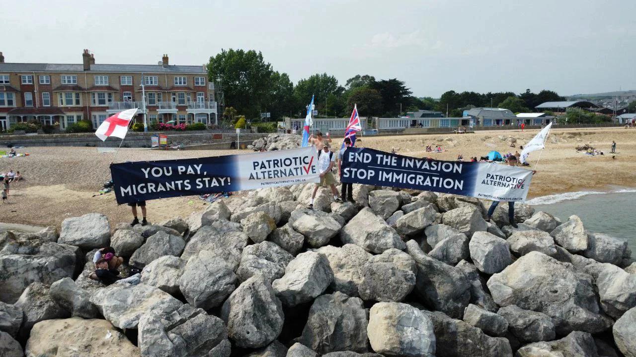 500 Migrants in a Barge? Weymouth Beach Banner Drop