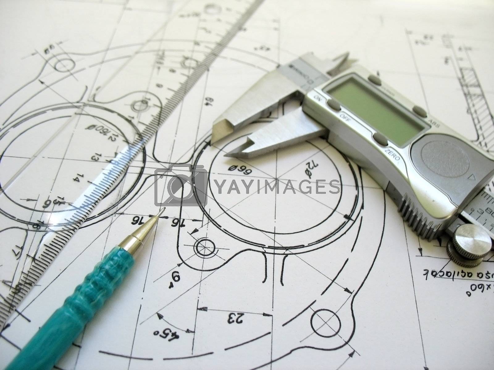 Engineering tools on technical drawing. Digital caliper, ruler and