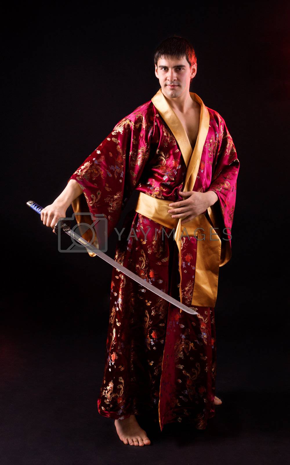 man holding samurai sword Royalty Free Stock Image Stock Photos
