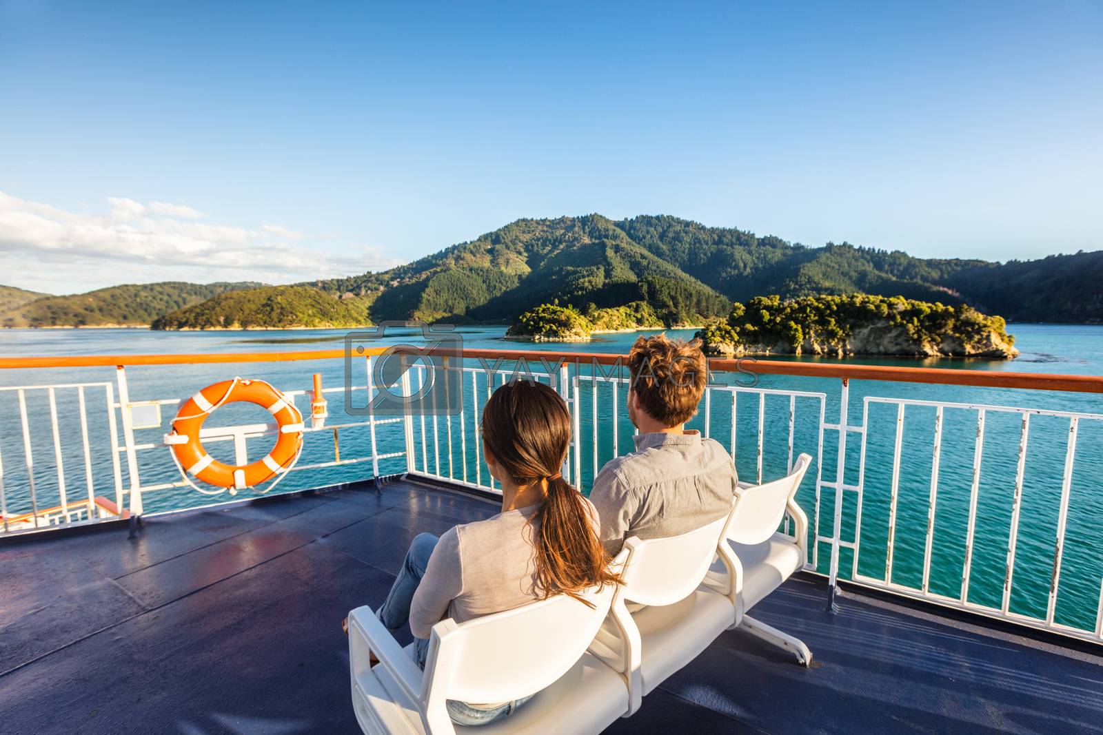 New Zealand cruise travel passengers enjoying nature view of ferry boat