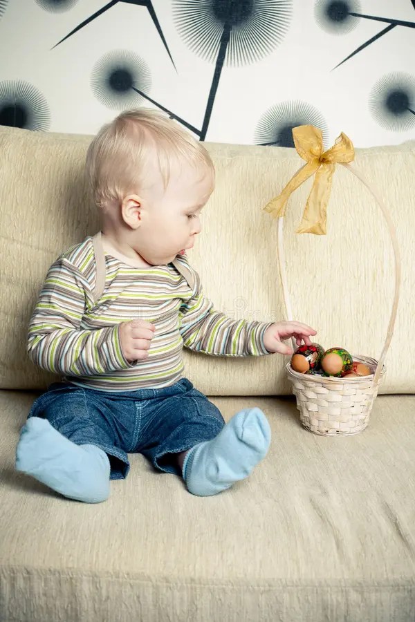 Boy with easter eggs stock image. Image of catholic, food 12777799