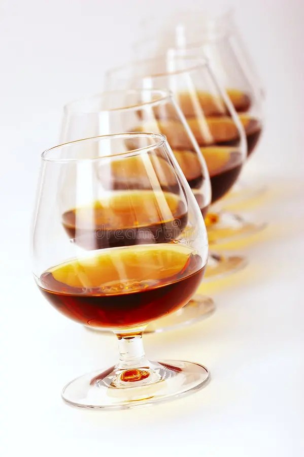 Brandy glass and bottle stock image. Image of hard, salute 530879