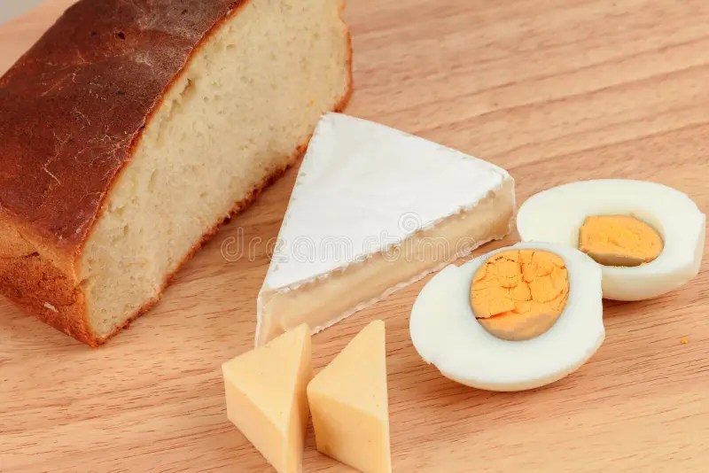 Bread, cheese and eggs stock image. Image of open, food 37523519