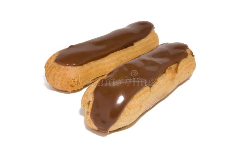 Chocolate Eclair on Black Plate Stock Image Image of calories