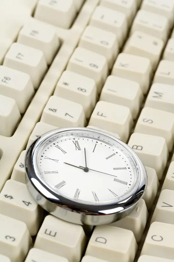 Clock and Computer Keyboard Stock Photo Image of urgency,