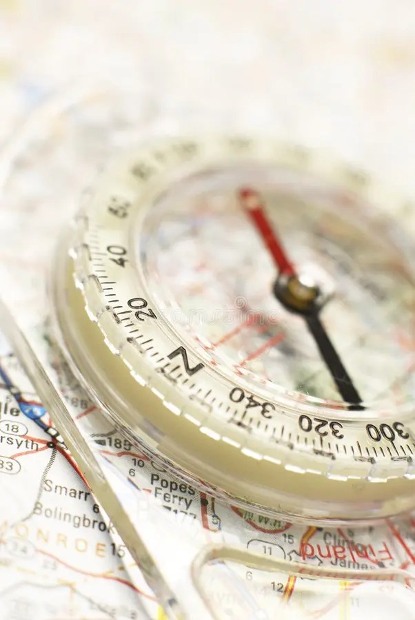 Compass on a map stock image. Image of line, longitude 8524325