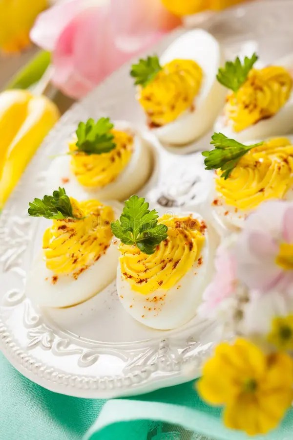Deviled eggs with paprika stock photo. Image of appetizing 238622620
