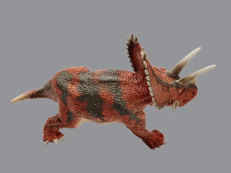 Brinquedo Cinzento Do Triceratops Da Vista Superior Com