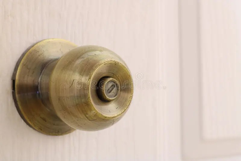Door knobs on white doors stock image. Image of door 161979295