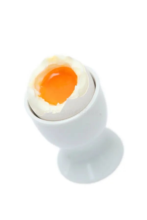 Traditional Fried Egg with Cracked Shell and Whole Egg Stock Photo