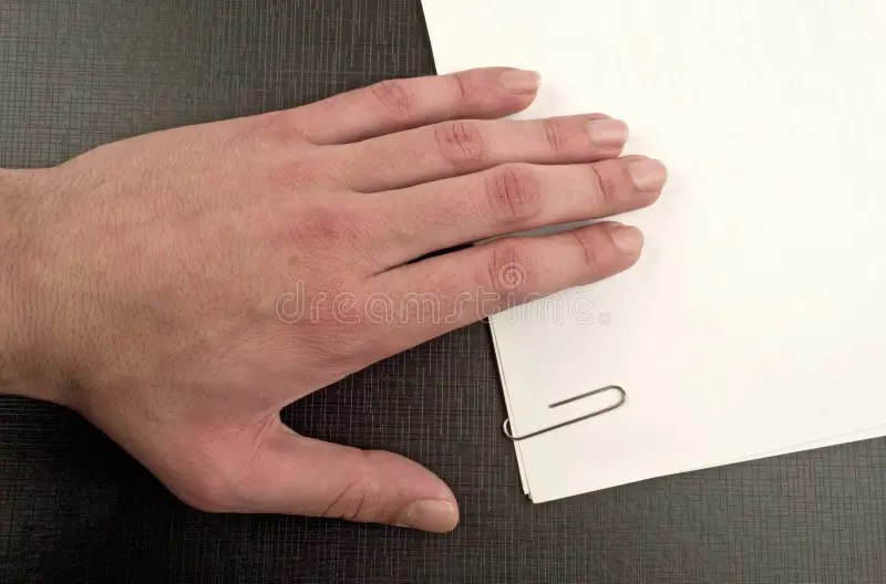 Hand on document stock image. Image of education, hardcover 18986505