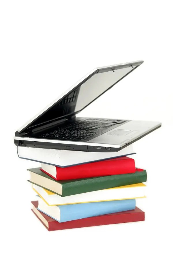 Laptop and Stack of Books stock photo. Image of education 1410220