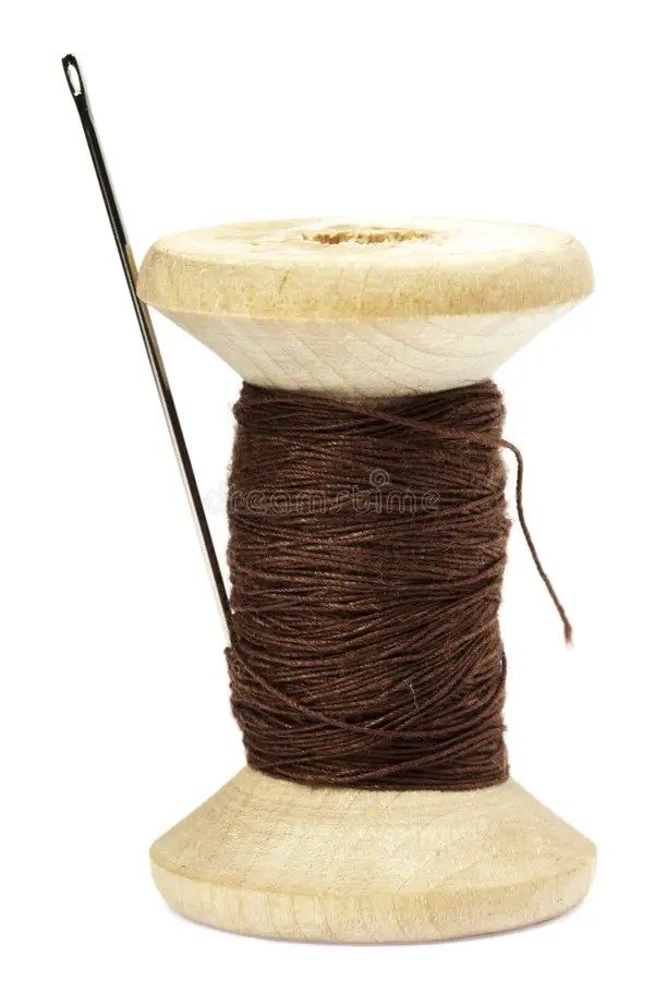 Sewing Spool with a Needle. a Sewing Needle Stock Photo Image of