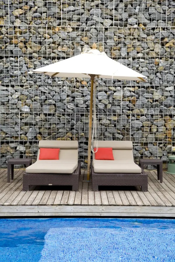 Poolside bench stock image. Image of deck, sunlight, nobody 26755949