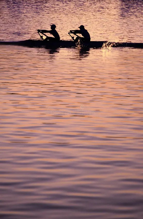 Rowing at Sunset on the Indian Ocean, Western Australia Stock Photo