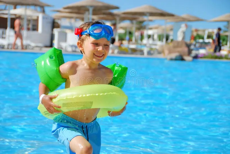 Boy In Colorful Float Ring In Swimming Pool Stock Image Image of
