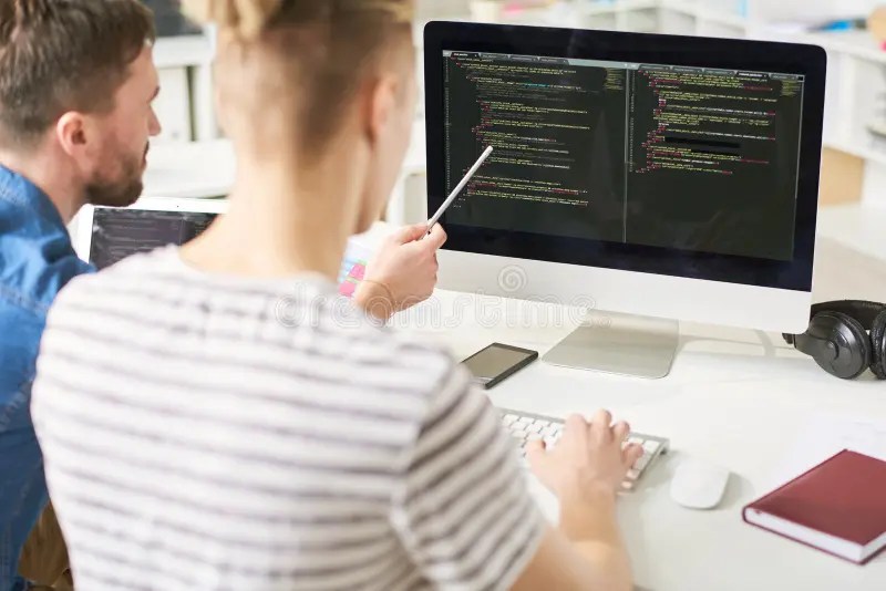 It Specialists Viewing Computer Code Stock Photo Image of analyzing