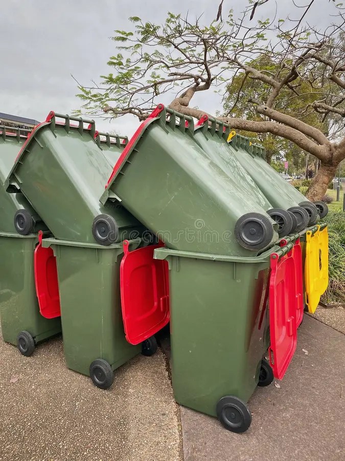 Stack of empty trash bins stock photo. Image of plastic 288038656