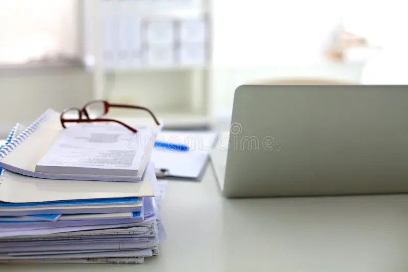 Stack of Papers and Glasses Lying on Table Stock Image Image of