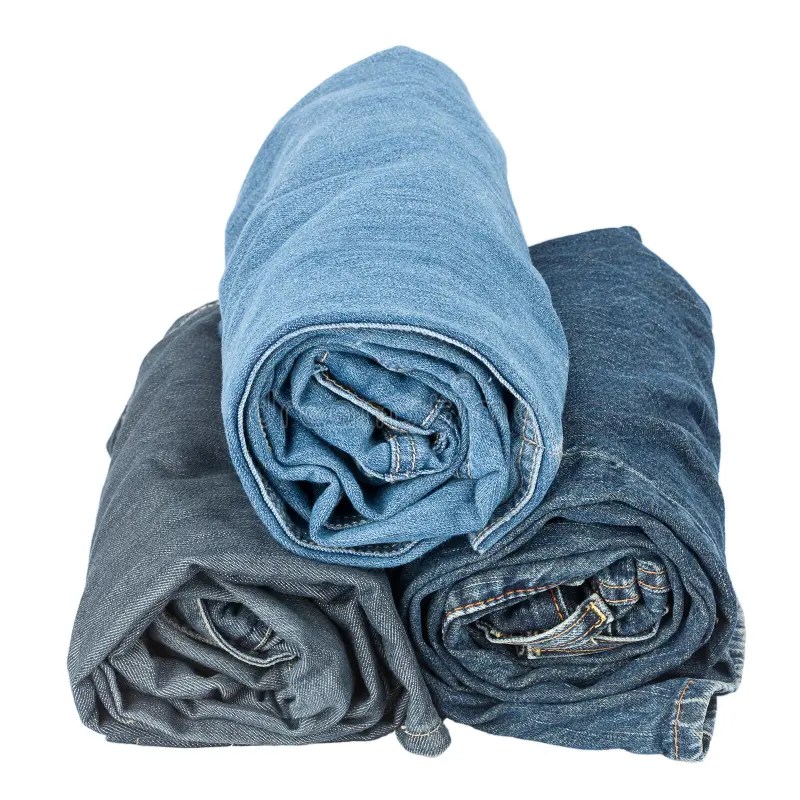 Stack of rolled jeans stock photo. Image of light, fold 25720252