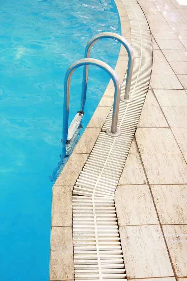 Steps in a water pool stock photo. Image of handrail 39353682