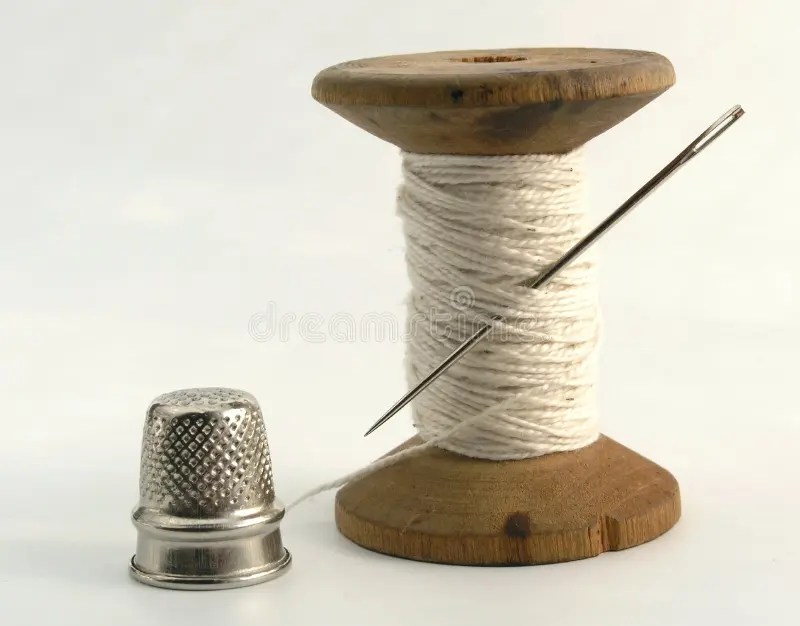 Thimble, needle and thread stock image. Image of tailoring 210327