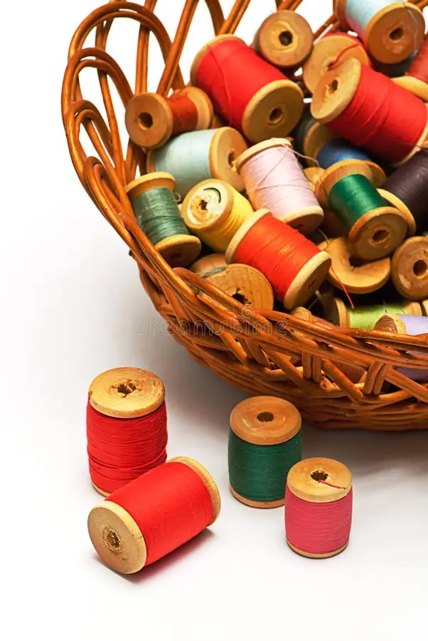 Thread spool and bobbin stock photo. Image of spun, blue 6589466