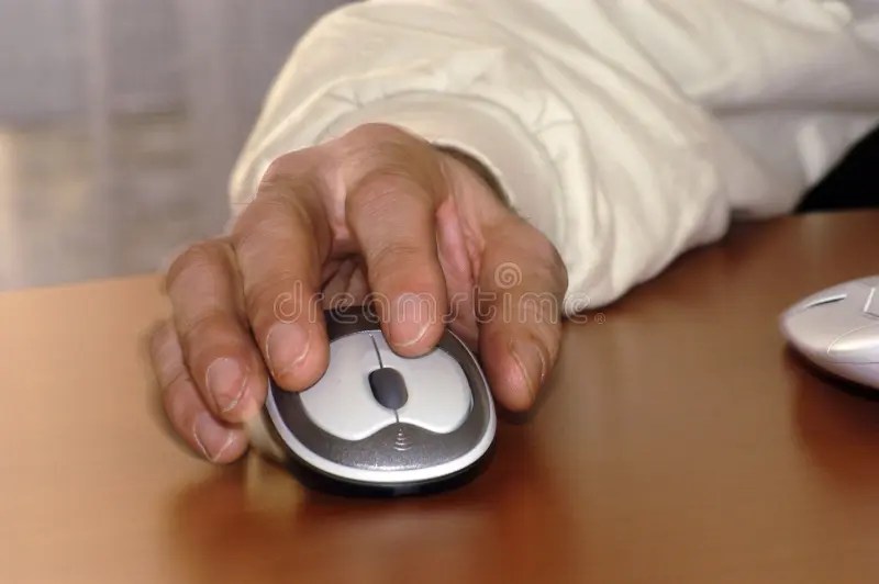 Working with a Computer Mouse Stock Photo Image of education, network